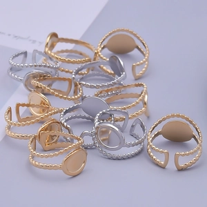 Detail of adjustable twisted rope ring blanks in gold and silver for DIY jewelry making