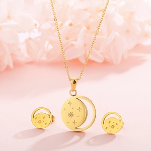 Golden titanium steel moon and star necklace with earring set on pink floral background