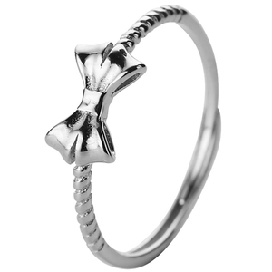Elegant silver bow ring for women featuring a stylish twisted band and high-polish finish