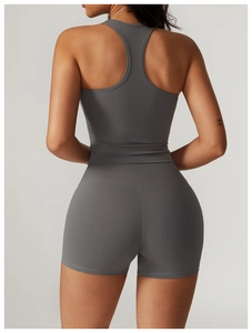 Close-up back view of grey racerback sports bra and high-waist shorts set