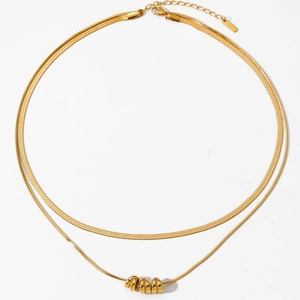Gold double-layered stainless steel necklace with flat snake chain and bead pendant