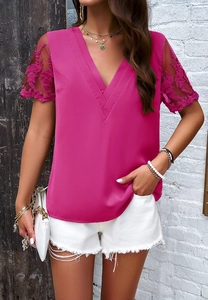 Close-up of rose red V-neck jacquard shirt with elegant lace sleeves and trim details