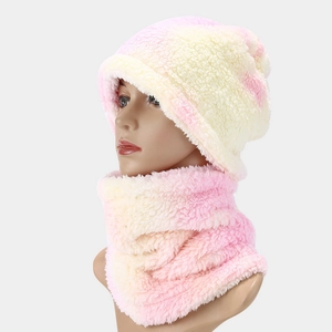 Detail of pink and cream tie-dye plush beanie and neck warmer set on a model