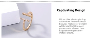 Detailed macro view showing mirror-plated gold finish and white zircon inlay on the T-ring