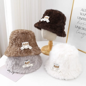 Plush teddy bear bucket hats in various colors for women with cute 3D bear ornaments