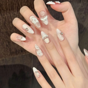 Elegant 3D flower almond press-on nails with glitter pink base, pearls and rhinestones