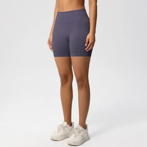 Close-up of seamless high-waisted fitness shorts in dark purple gray with firm fit