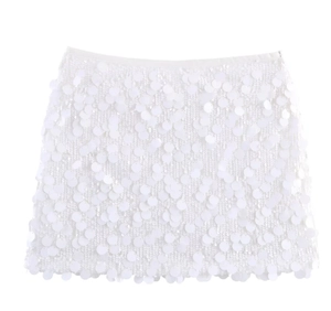 Detail of white mini skirt showing dense round sequins with shimmering texture and finish