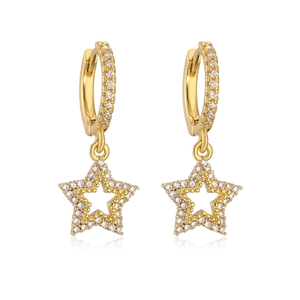 Detailed close-up of hollow star earrings in gold plating with sparkling cubic zirconia