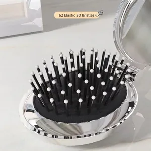 Silver folding hairbrush with 62 3D elastic bristles and portable mirror finish