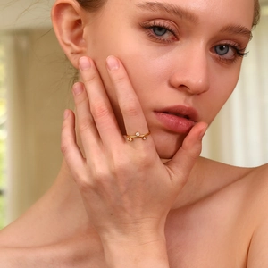 18K gold plated stainless steel crown ring featuring three sparkling white zircons