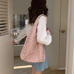 Pink floral lace tote bag for women with delicate hollow-out embroidery and long shoulder straps