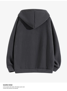Detail of dark grey polar fleece hoodie showing back view with elastic cuffs and thick texture