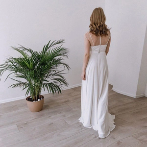 Elegantes weißes Brautkleid mit transparentem Netzrücken und Perlenknöpfen für Damen
