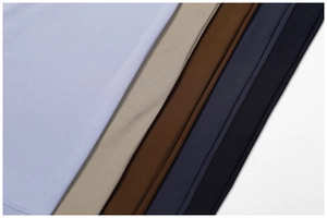 Detail of high-waisted yoga flare pants showing five colors and double-stitch seams