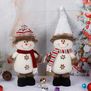Standing plush Christmas snowman dolls with knit hats and scarves for festive home decor