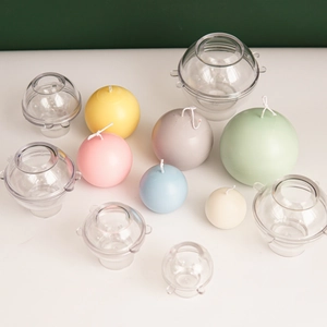 DIY round sphere candle mold with assorted colorful finished planet wax candles