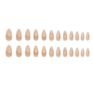 Nude pink marble almond press-on nails with gold starburst and rhinestone accents