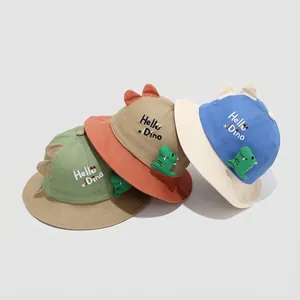 Three cotton dinosaur bucket hats for kids with Hello Dino embroidery and 3D spines