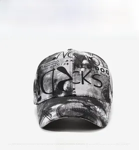 Front view of street style baseball cap with black and white graffiti letter prints