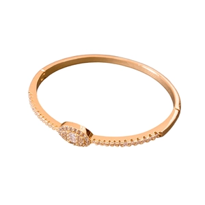 18K gold plated oval buckle bangle with rose gold finish and sparkling crystal pavé