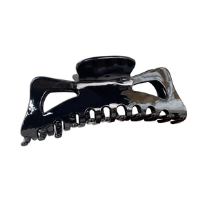 Glossy black acetate hollow-out shark hair claw clip for women with an elegant minimalist design