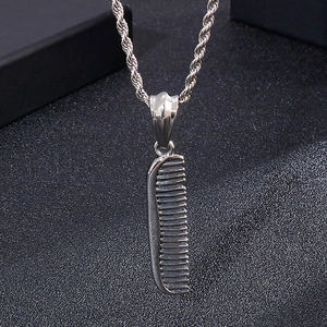 Detailed view of silver stainless steel comb pendant necklace with a twist chain