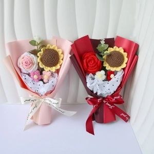 Detailed view of handmade knitted bouquets featuring crochet sunflowers and pink roses