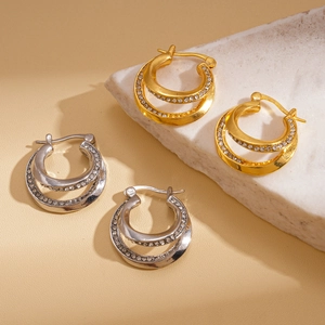 Double-layered geometric round hoop earrings with crystals in gold and silver finish