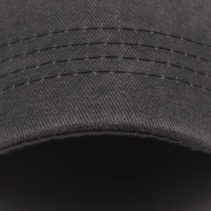 Close-up of the dark grey washed cotton brim with precise four-row reinforced stitching