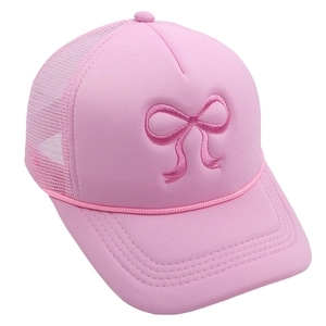 Close-up of pink truck hat featuring detailed bow embroidery and breathable mesh back