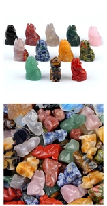 Macro detail of hand-carved natural gemstone wolf figurines in various vibrant crystal stones