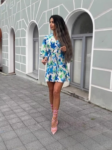 Chemisier élégant à imprimé floral avec col en V et taille coulissée pour un style urbain