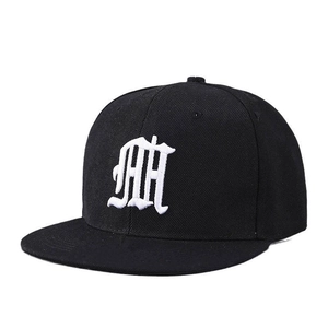 Detailed view of high-density twill cotton baseball cap with white gothic embroidery