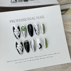Handmade long almond press-on nails with black snake pattern and green crystal gems