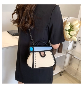 Close-up of 2D cartoon style canvas crossbody bag with comic-effect black outlines