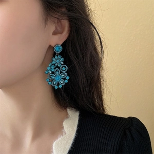 Elegant long blue rhinestone flower drop earrings with a vintage bohemian design