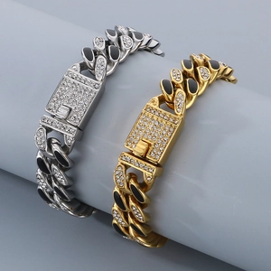 Detail of gold and silver 14mm Cuban chains with black resin and sparkling rhinestones