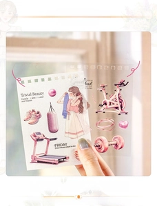 Macro detail of fitness-themed stickers in washi and PET material with pink gym designs