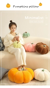 Minimalist pumpkin pillows in various colors shown in a cozy home interior setting