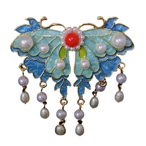 Pince à cheveux papillon vintage avec émail bleu, pierre rouge et pompons en perles