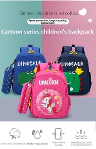 Detail of waterproof kids backpacks with dinosaur and unicorn prints and matching pencil cases