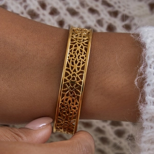 Vintage 18K gold-plated stainless steel lace cuff bracelet with geometric hollow pattern