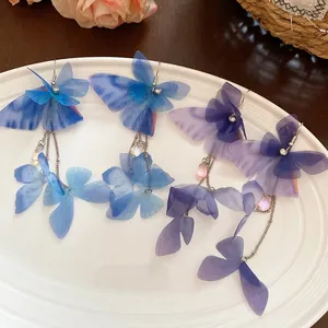 Elegant fabric butterfly tassel earrings with blue and purple crystal beads in 85 characters
