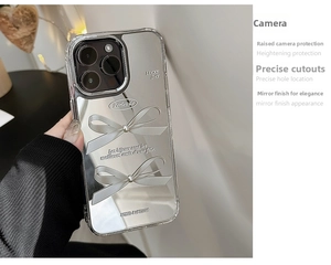 Mirror silver iPhone case featuring 3D bow accents and high-gloss reflective finish