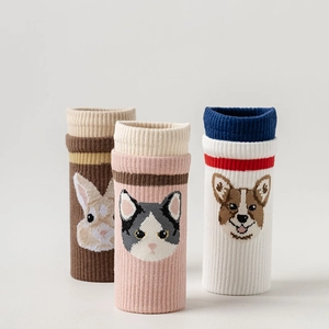 Detail of high-elasticity knitted chair leg floor protectors with cute animal patterns