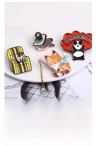 Detail of four creative enamel animal brooches featuring a fox, dog, pigeon, and panda