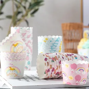 Pastel unicorn and rainbow patterns on muffin paper cups for home baking decoration