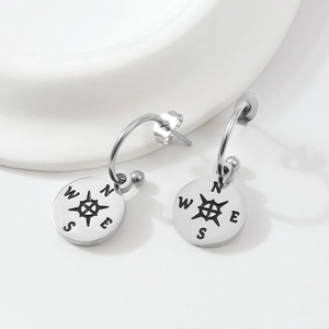Polished stainless steel compass earrings for women with engraved NSEW direction letters