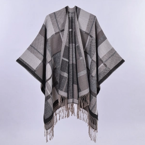 Thick ethnic style tassel knit poncho with gray and beige plaid pattern in loose fit